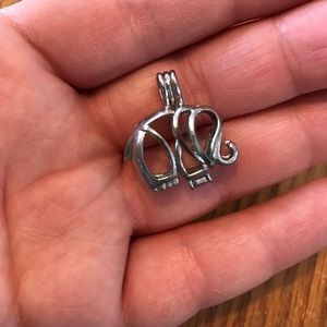 Pearl cage—elephant